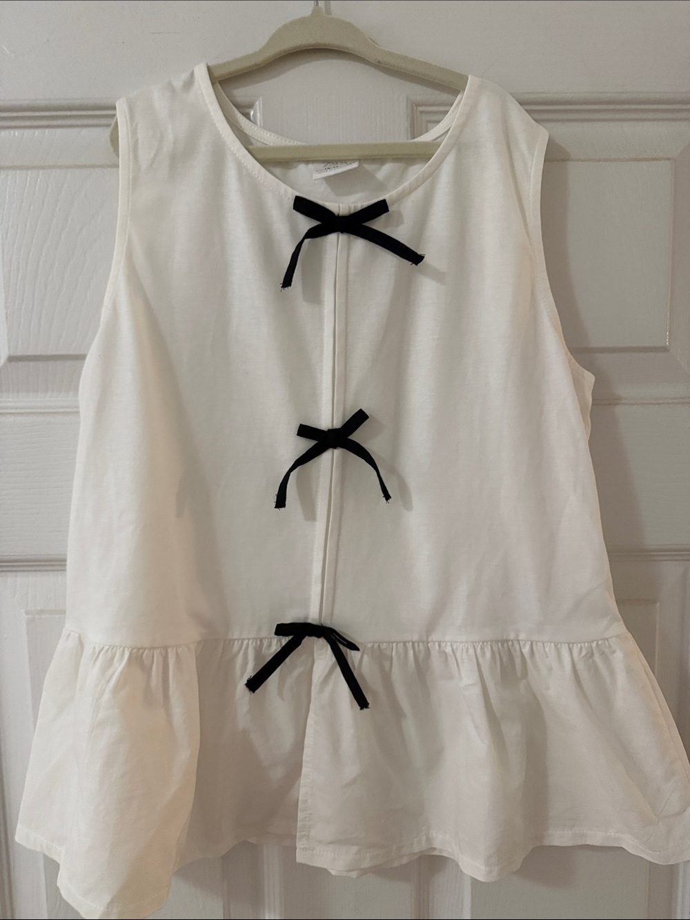 Zara Cream Sleeveless Peplum Dress with Black Bows